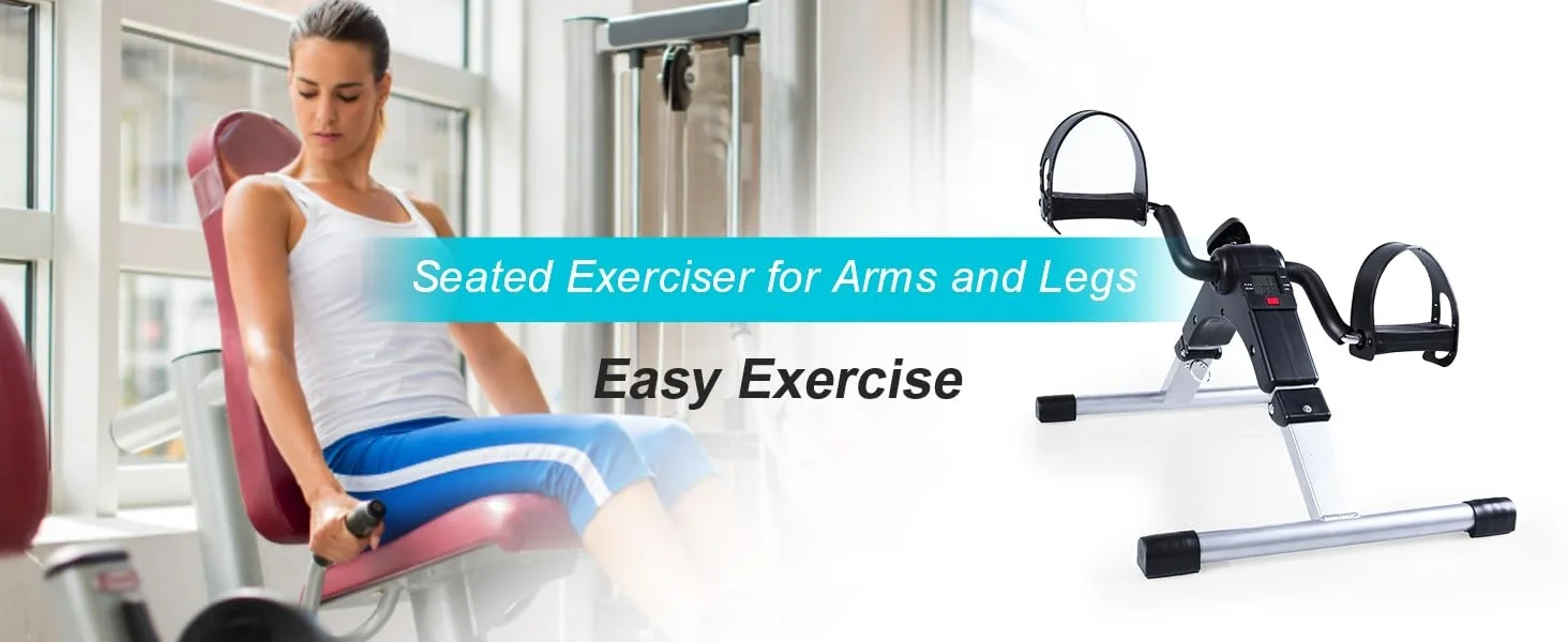 Mini sobni bicikl postavljen ispod stola za vježbanje u sjedećem položaju