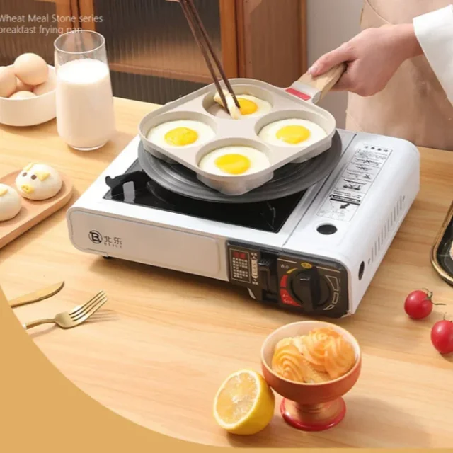 Padella per uova a quattro fori con coperchio Padella antiaderente Mini pietra di mica per uso domestico Padella per colazione Macchina per friggere le uova Utensile da cucina 4