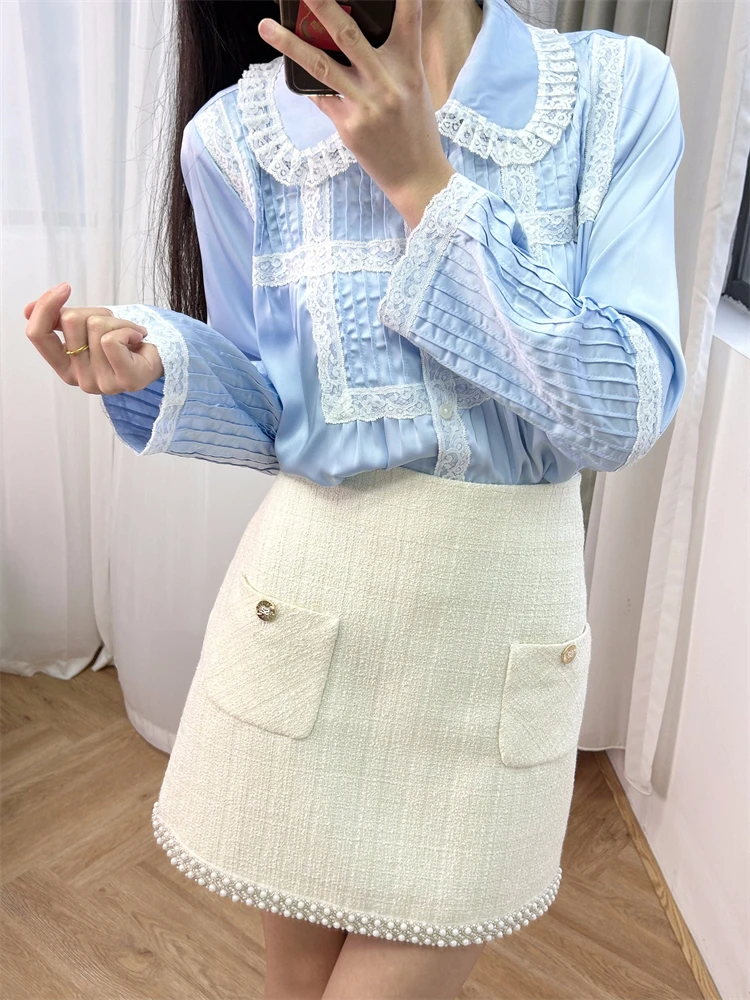 

Traff 2024 woman "Sweet French" lace ruffled long sleeved shirt with pressed pleats to reduce age, niche light blue top