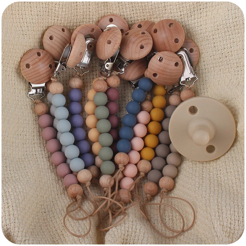 

Beech Wood Chew Bead Pacifier Clips Dummy Chain Holder For Newborn Cute Soother Chains Nipple Holder Baby Teething Toy Baby Chew