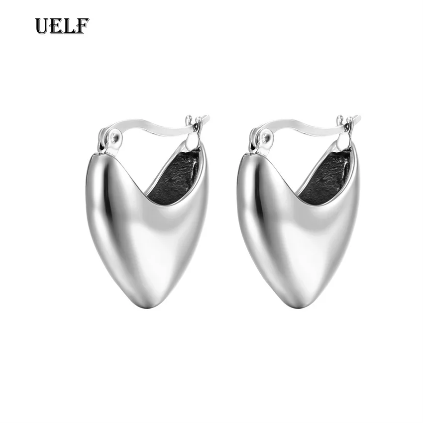 

Серьги-гвоздики женские серебряного цвета в форме сердца