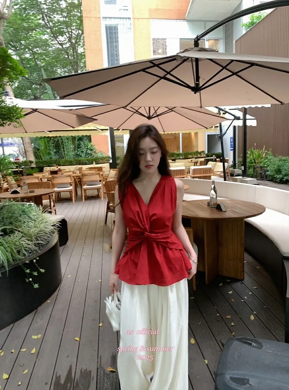 Image of Designer Twist Knot V-neck Vest for Women 2025 Summer New Resort Style Niche Slim-fit Unique Sleeveless Top