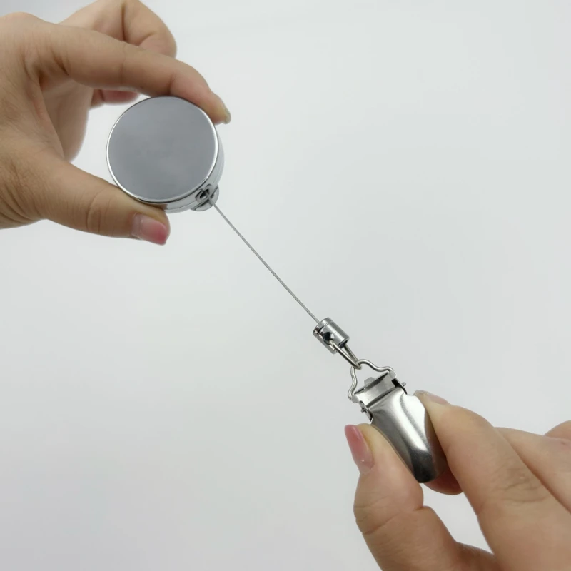 Toallero retráctil automático – Soporte de pared autoadhesivo sin taladro