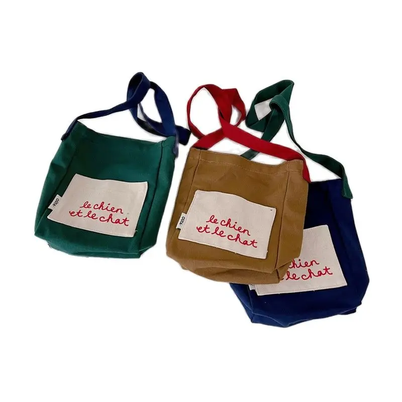 

2022 South Korea same style children's oblique cross bag letter open big pocket bag trendy casual shoulder bag