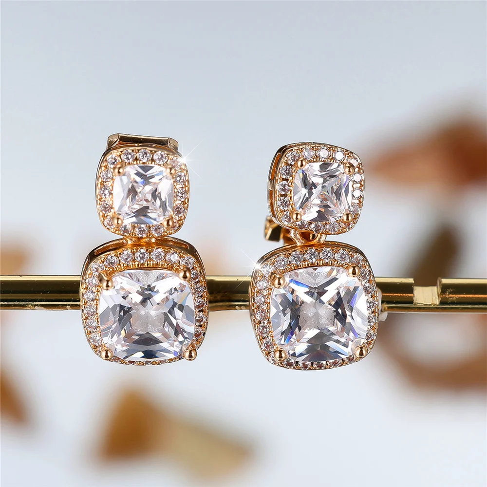 Orecchini Cuore in oro e zirconi bianchi e colore smeraldo collezione