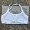Soutien-gorge de yoga pour femme, couleur unie, à quatre bretelles croisées dans le dos, dos évidé, push-up, avec coussinets de poitrine, idéal pour le fitness et le sport