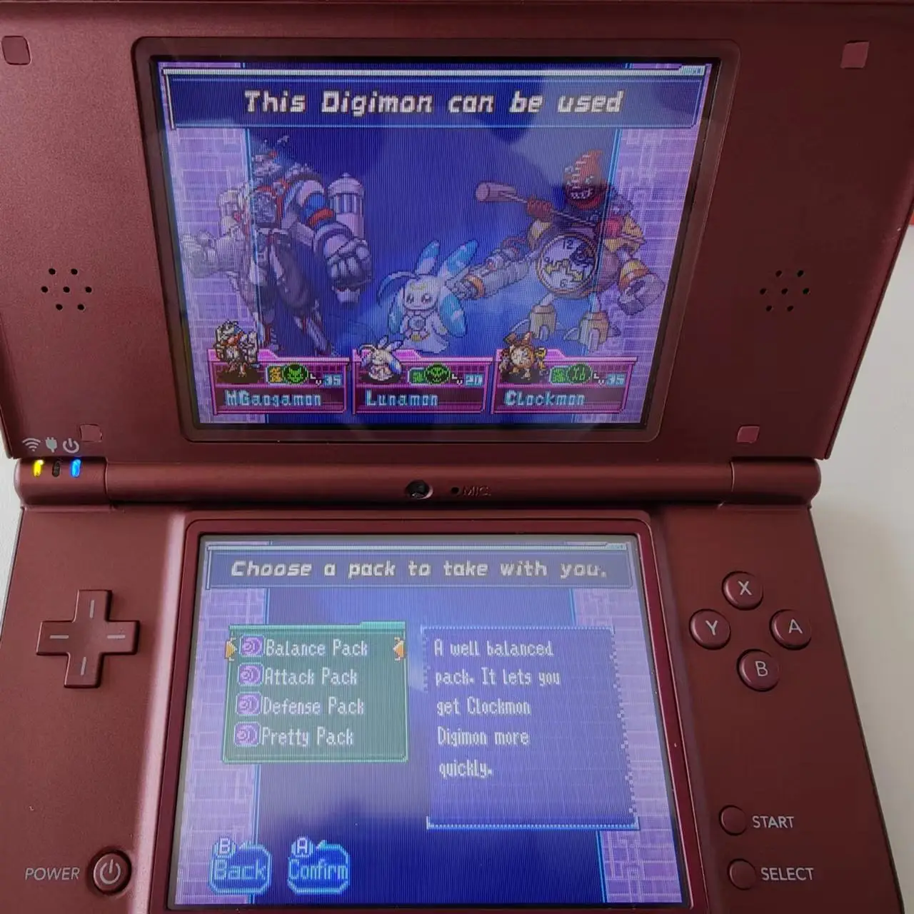 Restored Nintendo DSi XL (Burgundy) Handheld Video Game Console with Stylus  and Charger (Refurbished) 