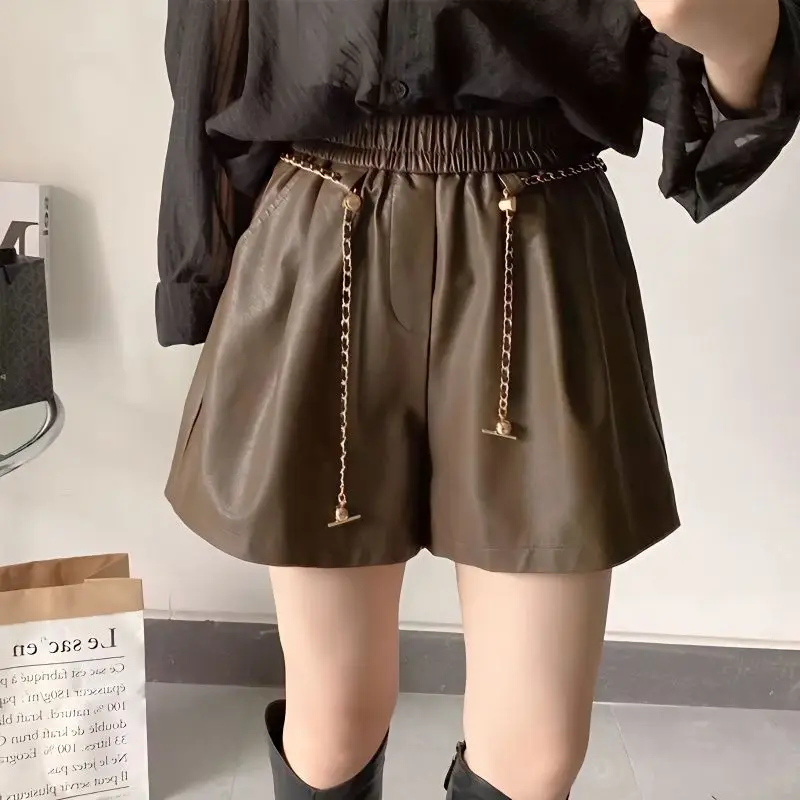 Fashion Korean Solid Leather Shorts Women's Clothing Spring Autumn Loose Wide Leg Chain Patchwork Trend Elastic Waist Pants