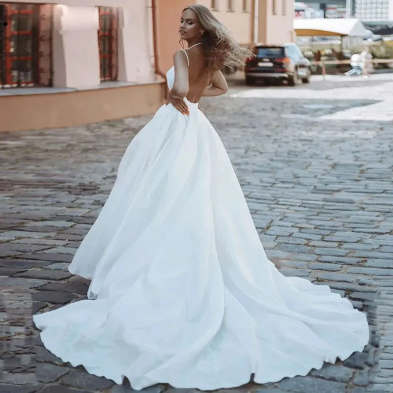 

Высококачественные свадебные атласные платья а-силуэта на тонких бретельках с открытой спиной для невесты