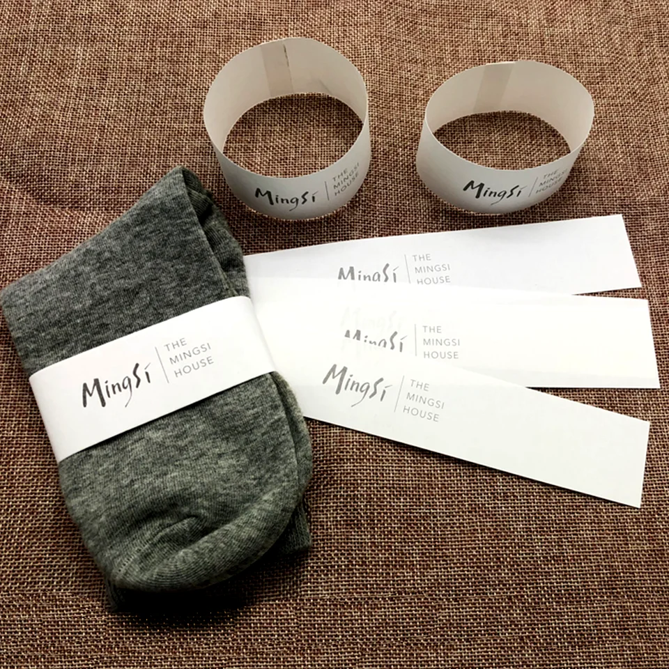 

Custom Wholesale Printed LOGO Socks Sleeve Paper Tape Wrapping Card Packing Thick Kraft Paper Waist Sealing