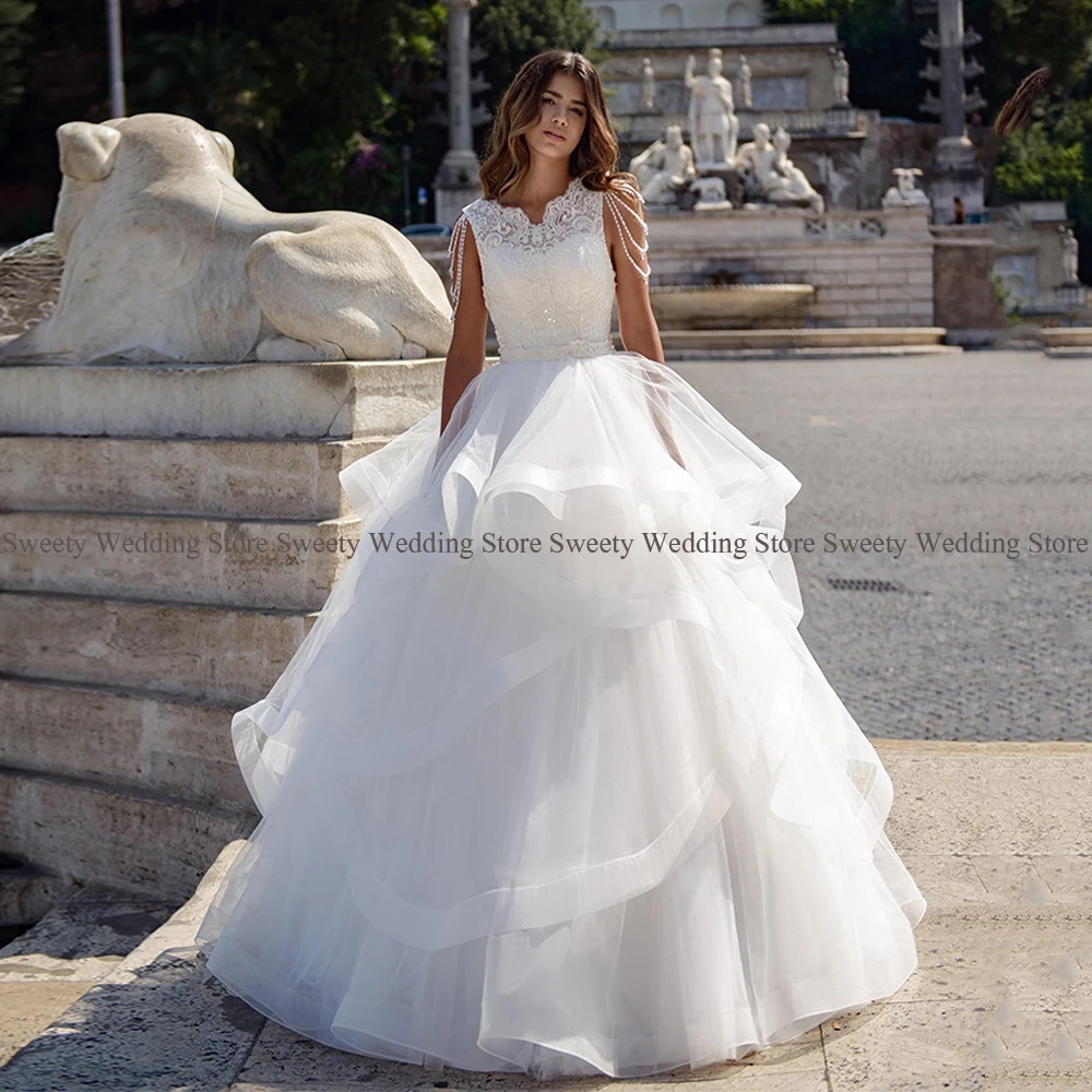 

2023 Ruffles Wedding Dress Bride Cap Sleeve V Neck Pearls Sequin Applique Tulle Floor Length A Line Robe De Mariee Bridal Gown