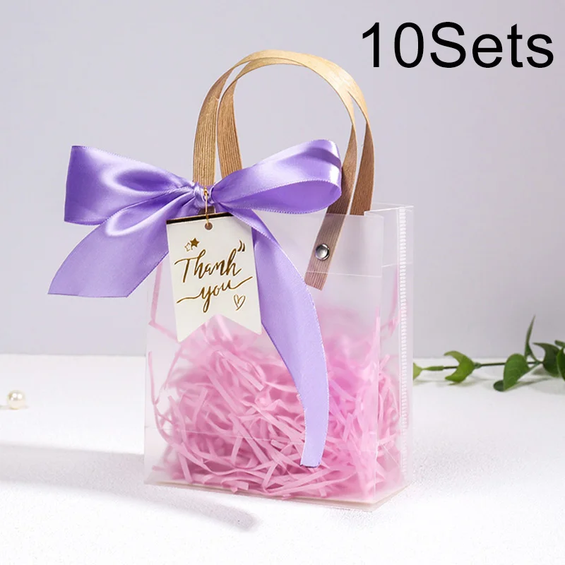 Zinaroty 16 sacchetti regalo in plastica trasparente con manico, riutilizzabili, sacchetti per confezioni regalo, bomboniere, regali per bambini, shopping e altri usi commerciali. (16 x 15 x 7 cm
