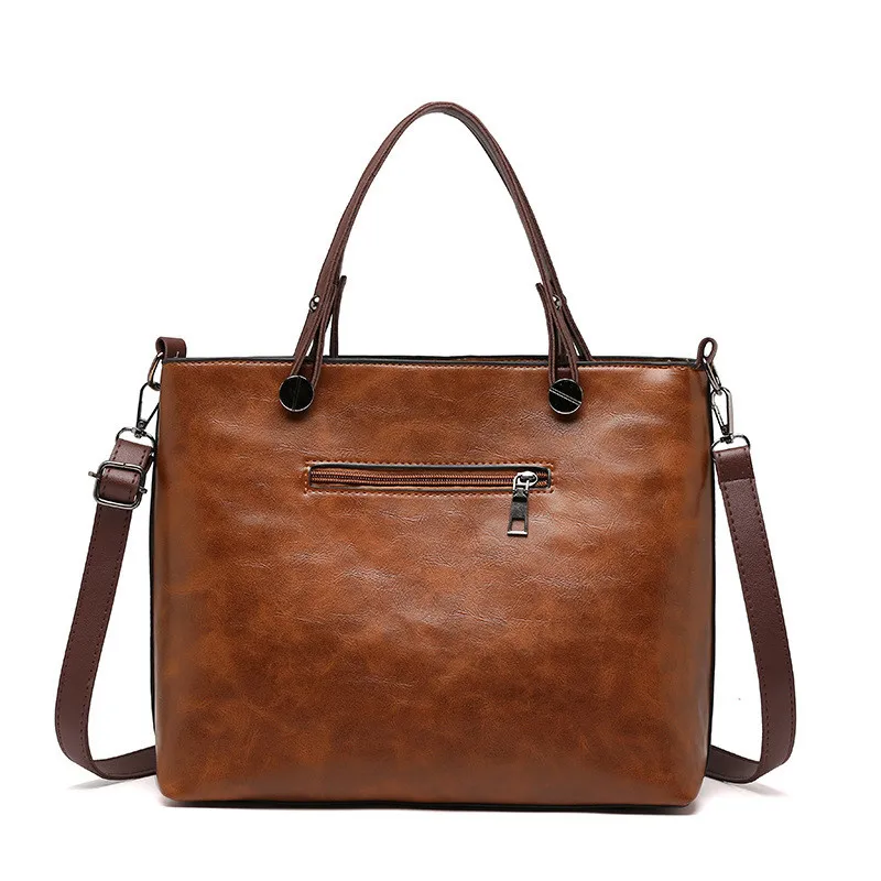 Retro leather handbag with two zipper pockets, versatile tote and crossbody style, classic women’s work and business bag. 1548