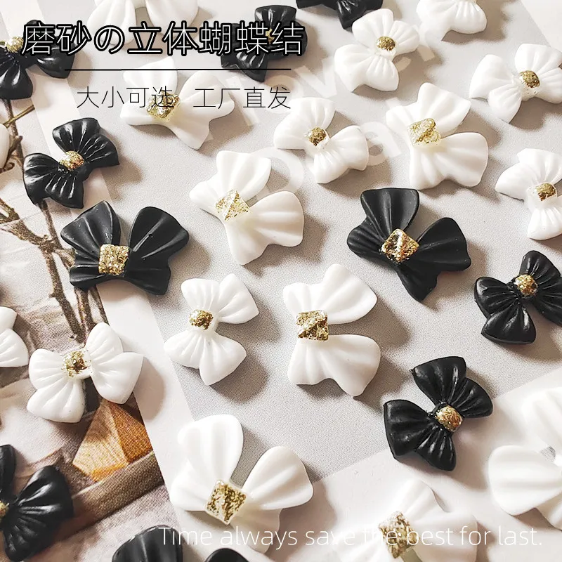 

20Pcs Metal Frosted DIY Bow Nail Art Decoration 3D Ribbon Charm Manicure Accessories White/Black 14X10mm Nail Rhinestones Gems
