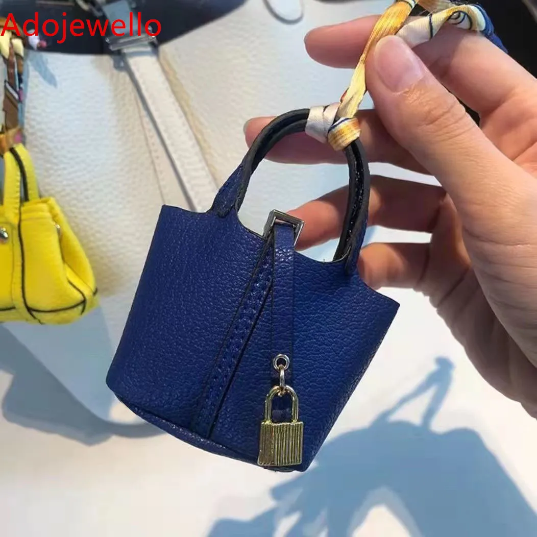 

Миниатюрный милый кожаный брелок для ключей автомобиля