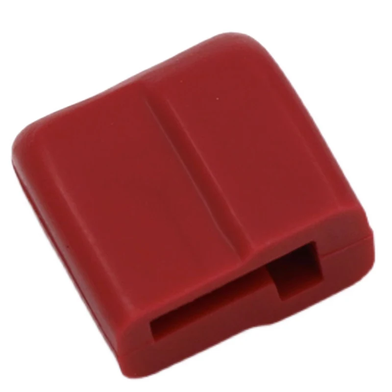 Gros plan sur un capuchon de protection pour connecteur Amass Dean, avec texture antidérapante visible.