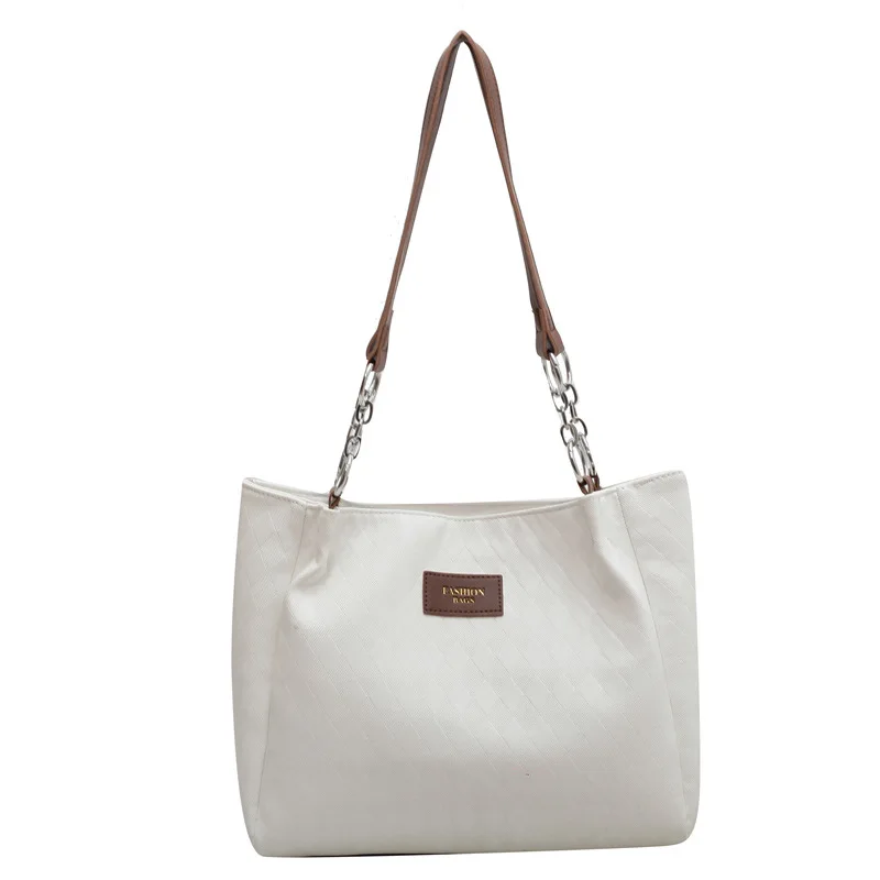 

Large-capacity bag women's bag 2023 new spring high-end niche class commuter bag versatile shoulder tote bag