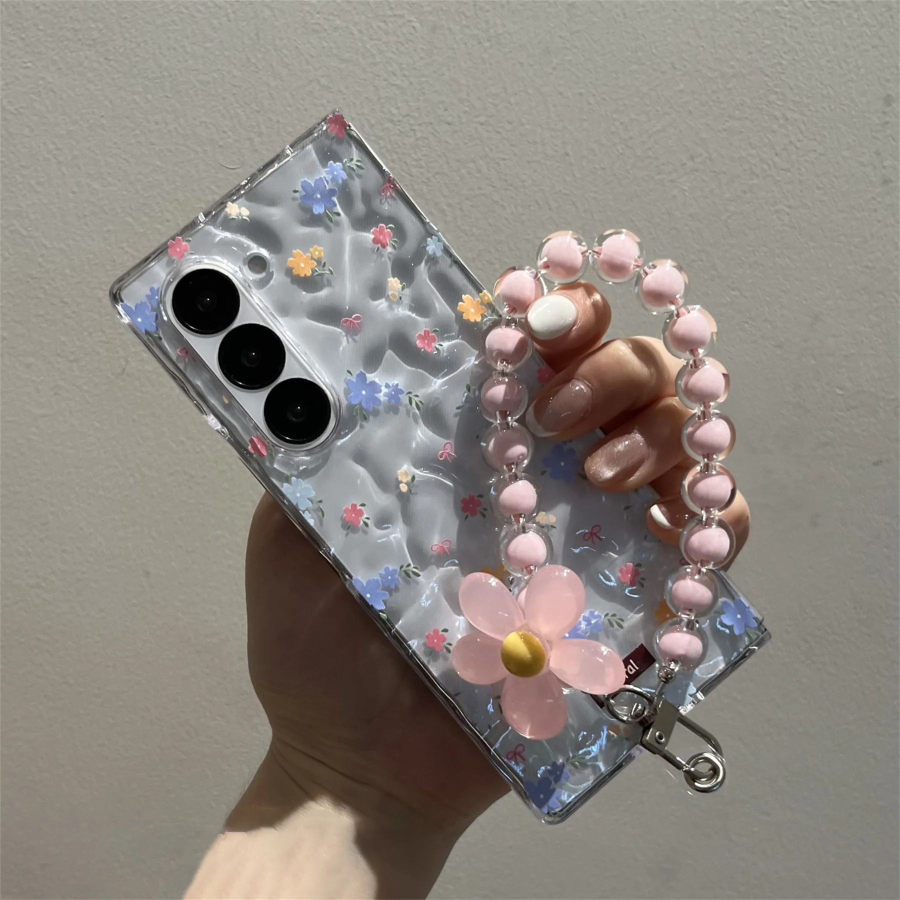 Cute Blue Floral Transparent Phone Case with Flower Chain Accents