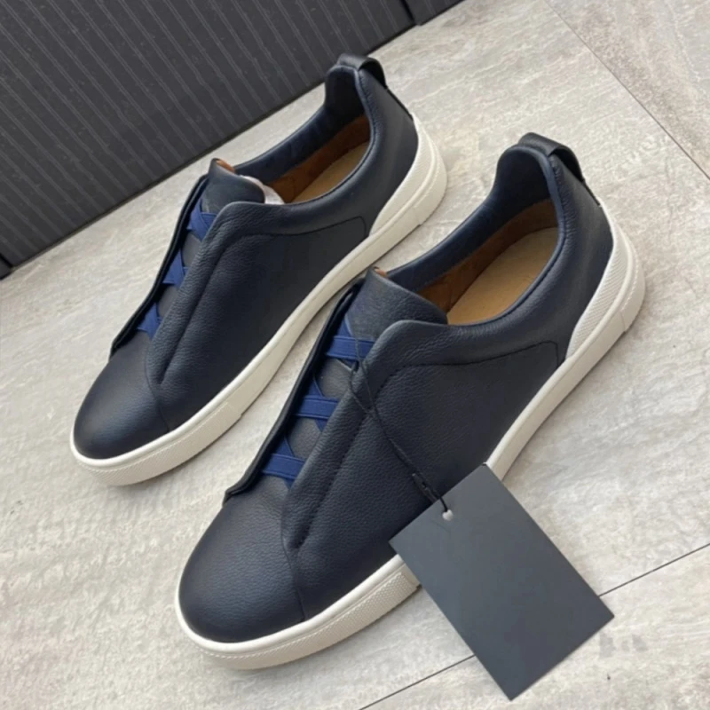 

Classic new man's luxury 2024 leather flat bottom walking casual shoes white man's sports lazy shoes