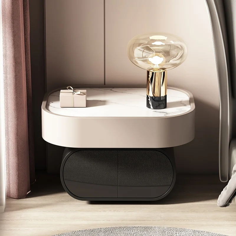 

Light luxury bedside table high-end new net red design round solid wood simple and modern