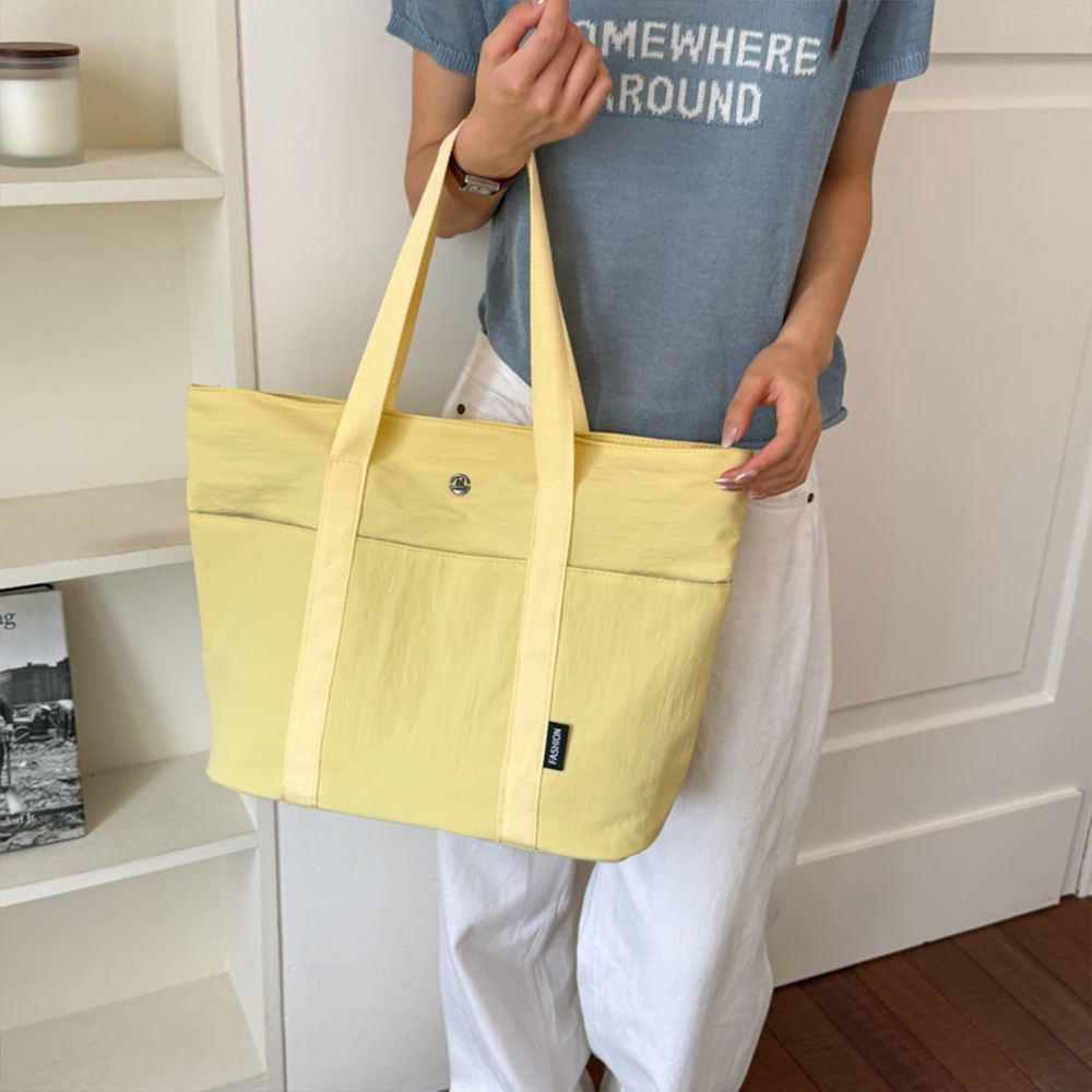 Borsa tote in tela casual, alla moda e di tendenza, con grande capacità, leggera, ideale per il pendolarismo, dal design semplice. - immagine 5