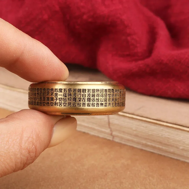 Buddha\'s rotatable brass fingertip top Zen Heart Sutra finger toy Great Compassion Mantra copper ornaments handicraft