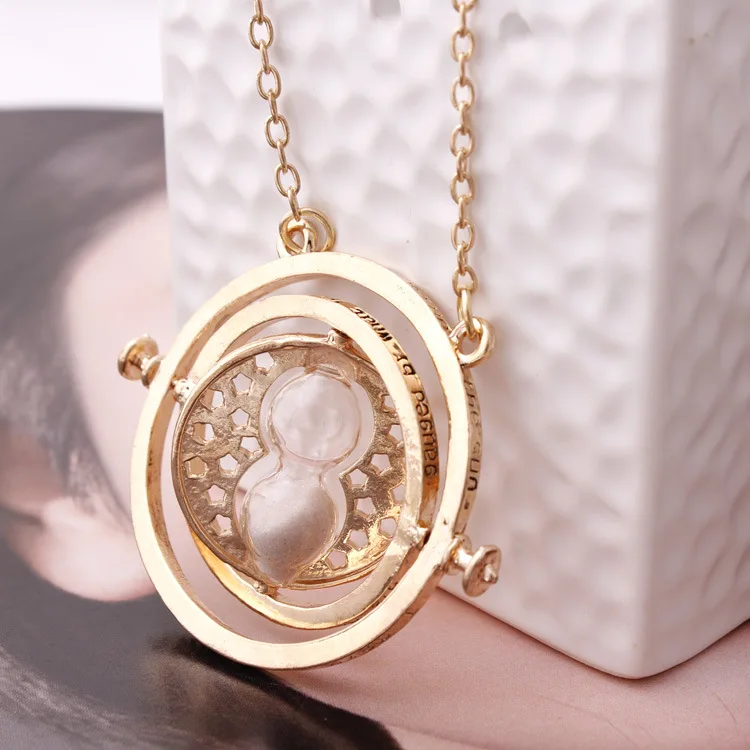 

(20pcs/lot)Sand clock Time Turner The sandglass charm Rotating Spins Gold Hourglass pendant necklace Wholesale