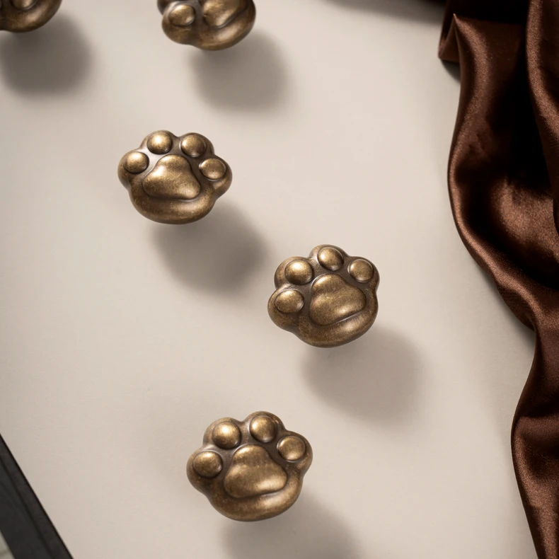 solid brass cat paw cabinet knob antique finish