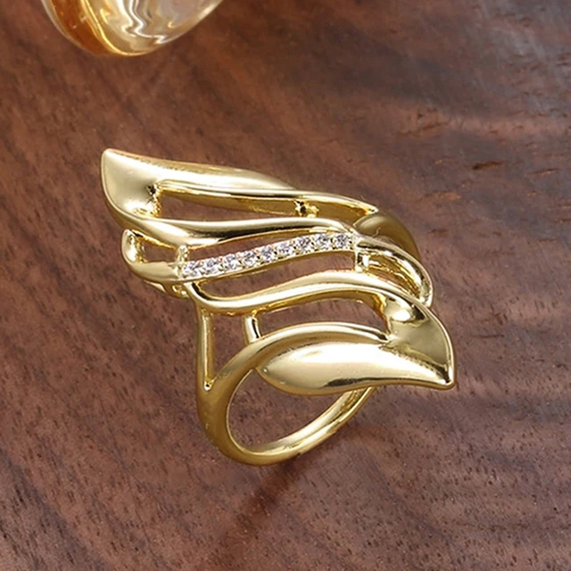Huitan Hyperbole Marquise en forme de couleur or anneaux pour les femmes entièrement pavé éblouissant CZ nouveaux accessoires de bande de mariage à la mode bijoux