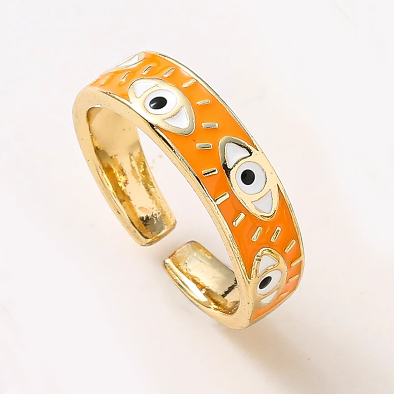 Anel dourado e laranja