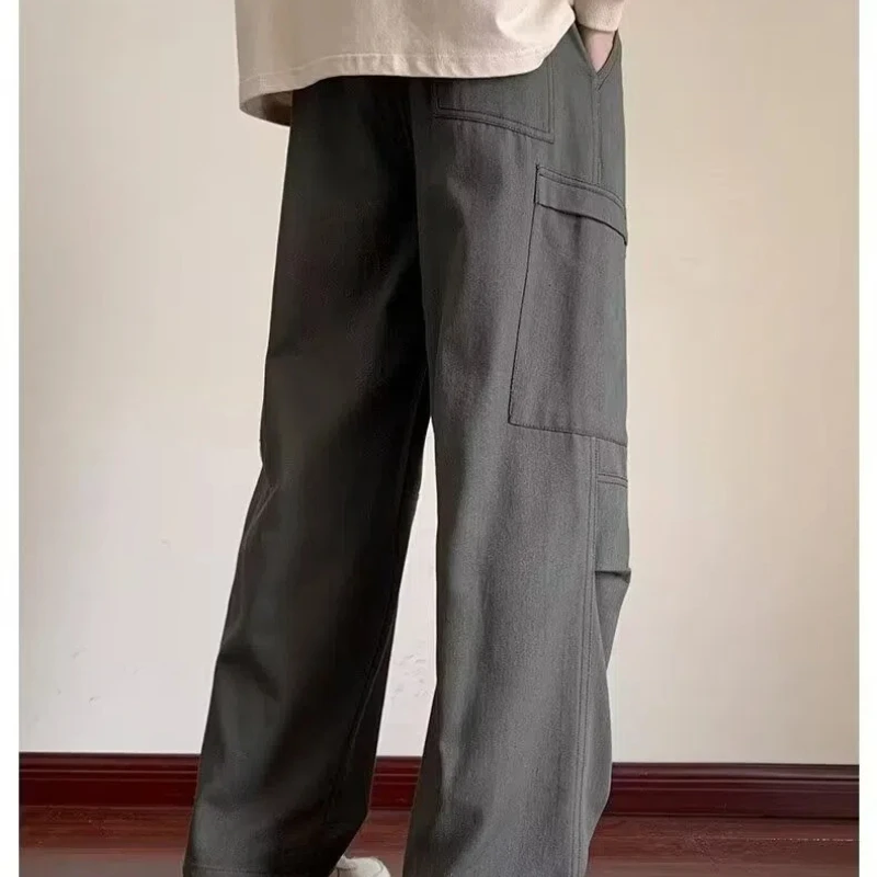 Abbigliamento da uomo autunno inverno coulisse tinta unita tasche elastiche a vita alta Casual pantaloni larghi comodi Boyfriend coreani 4