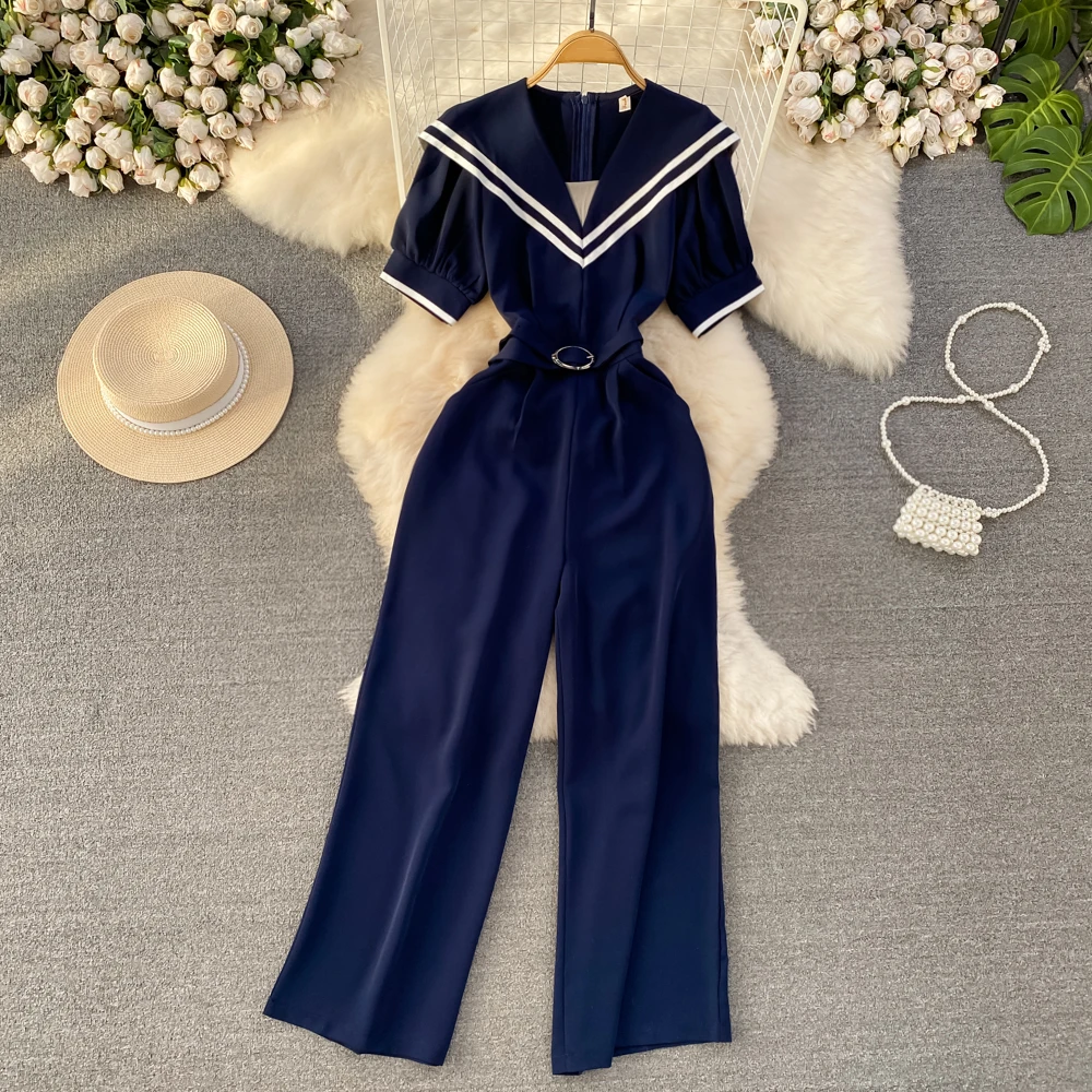 

Clothland Women Fashion Sailor Collar Jumpsuits Belt Short Sleeve High Waist Navy Blue Long Playsuits Mujer KA347