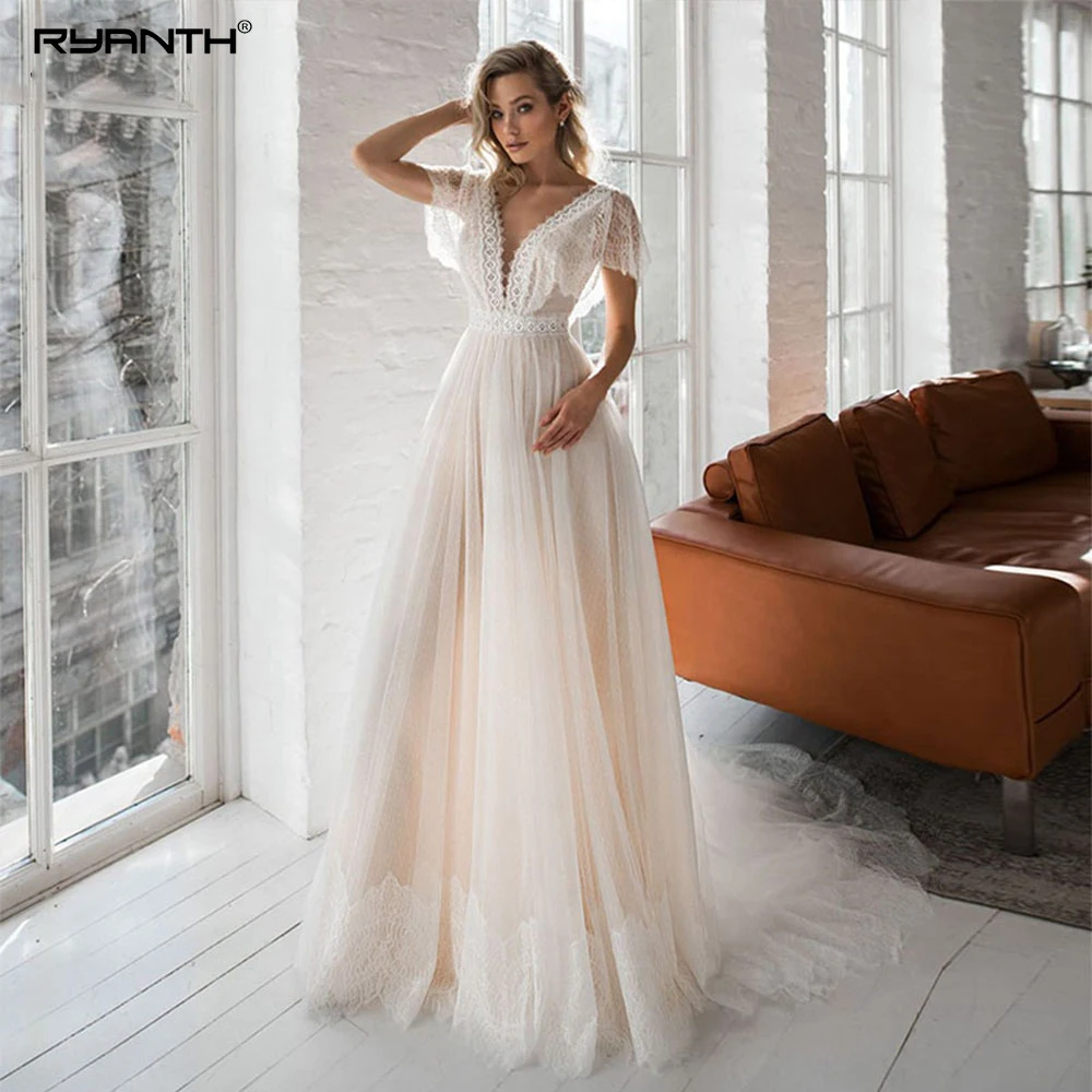 

Ryanth Boho Cap Sleeves Dot Tulle Wedding Dresses Backless Lace Appliques Beach Bridal Gowns 2023 Robe De Mariée V-Neck Vestidos