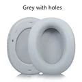 Grey with holes