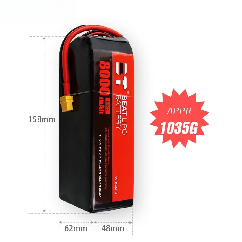 Batterie Lipo 22.2V 6S 8000mAh 65C posée à côté d'un drone FPV, prête à l'emploi