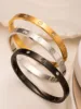 Premium Stainless Steel Water-Resistant Women's Bangle 18K Gold-Plated with Hypoallergenic Crystal-Studded Screw Pattern 1