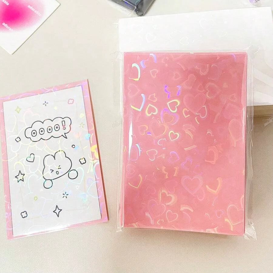 50pcs 다채로운 레이저 하트 카드 필름 심장 모양의 반짝이는 보호 ID 학생 게임 마카롱 레이저 카드 PVC 카드 슬리브