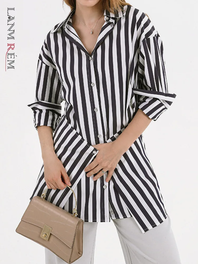 [LANMREM] Designer Spliced Striped Shirts Women Irregular Lapel Long Sleeve Fit Blouses Fashion Tide Spring 2024 New Tops the ebb tide