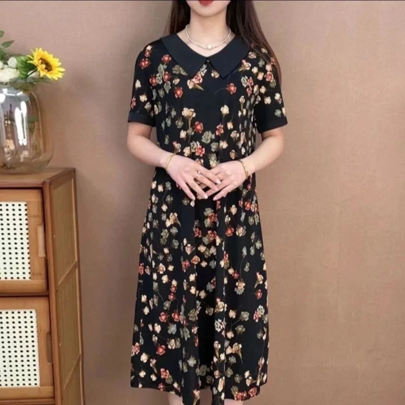 

2024 Women's Summer New Fashionable Commuter Spliced Printed V-neck Short Sleeve Pullover Loose A-line Middle Aged Elderly Dress