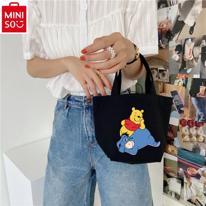 MINISO Disney Fashion Canvas Bag Handbag Women's Cartoon Winnie Bear Print Makeup Storage Sweet and Fresh Portable Handbag