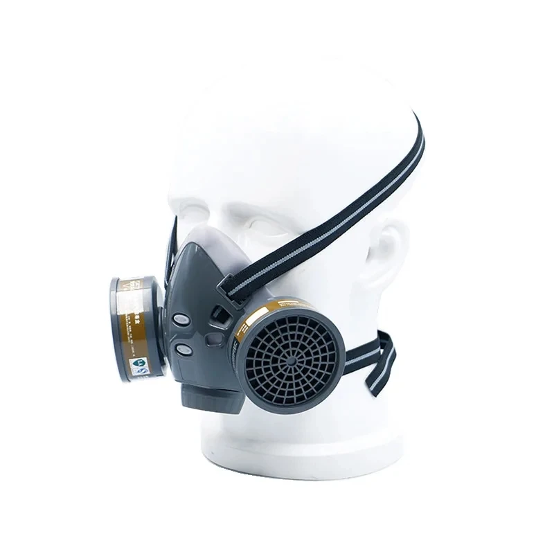 Détail des filtres du masque à gaz industriel, avec indication de compatibilité pour peinture et poussières fines.
