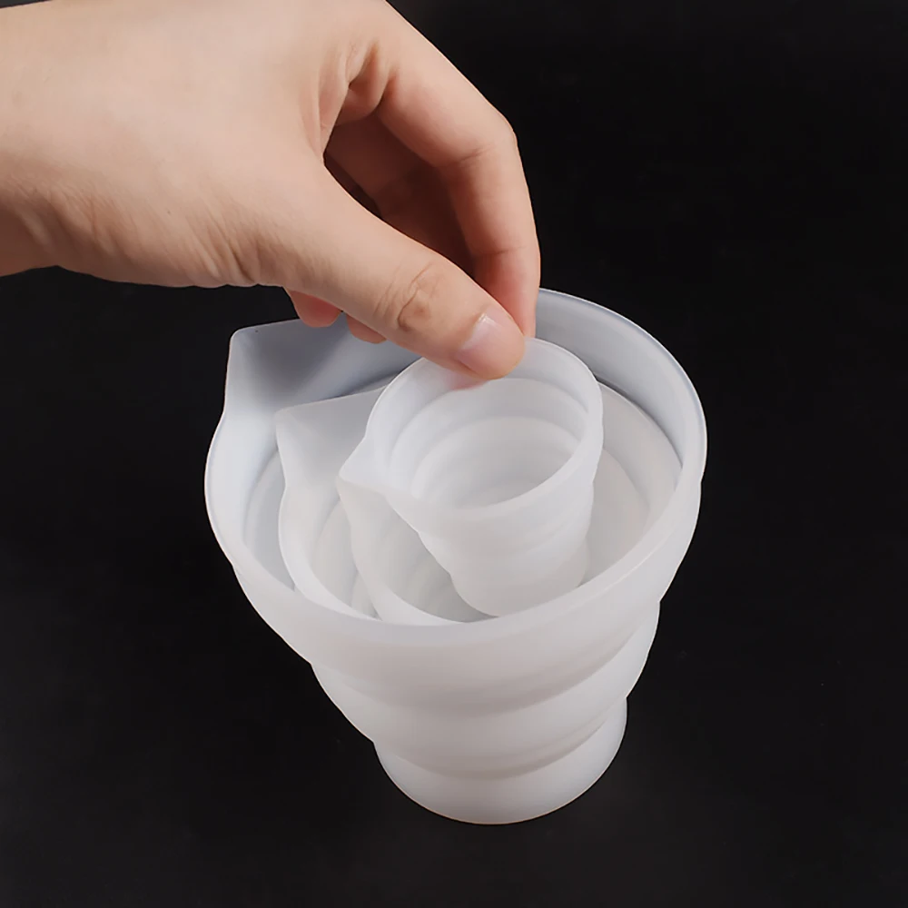 https://ae01.alicdn.com/kf/Sadb070b36f9b4d14a525122b1c3a5e0dq/50-500ml-Foldable-Silicone-Measuring-Cup-Multi-spec-Portable-Liquid-Container-Silicone-Mixing-Cup-For-DIY.jpg