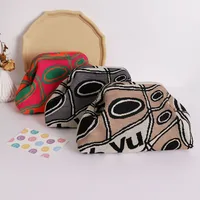 Trendy knitted clip bag versatile large capacity suitable for storage bags New high-end pattern clutch bag - Image 2