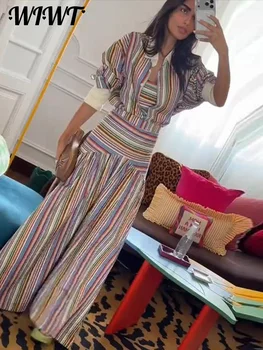 طقم نسائي بلوزة مقلّمة وتنورة طويلة بكسرات — صورة 4