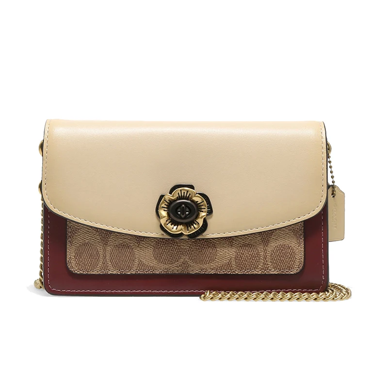 thumbnail image 1 of Bolso bandolera Parker Ladies Camellia de lona revestida y piel, 1 of 4