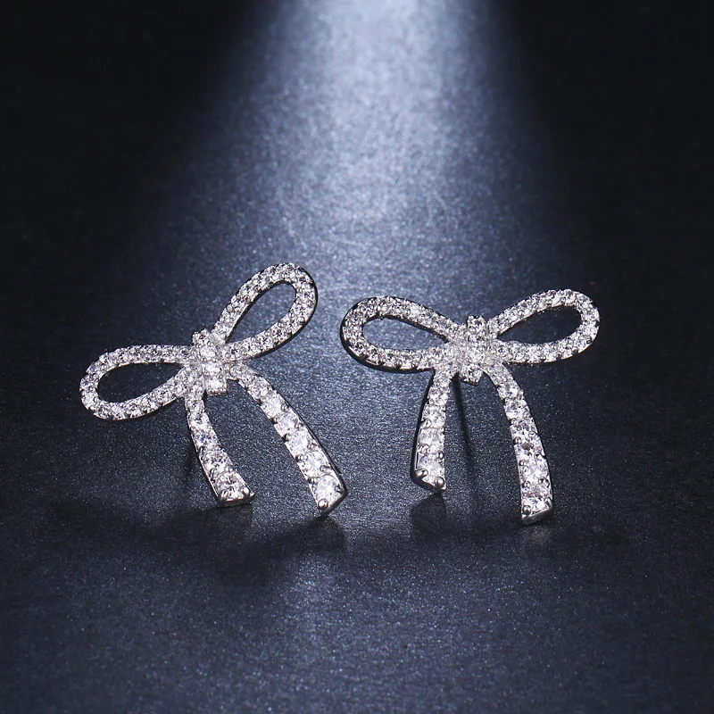 Zircon earrings with bows