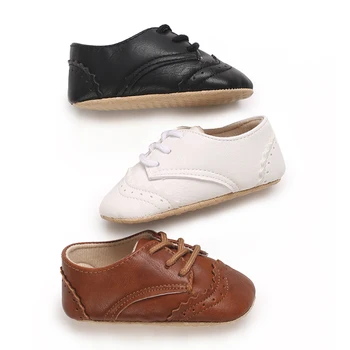 Nuovo 0-18M Scarpe per bambini Ragazzo Neonato Bambino Casual Cravatta le scarpe Suola antiscivolo in pelle PU Primi camminatori Crawl Scarpe da culla 1