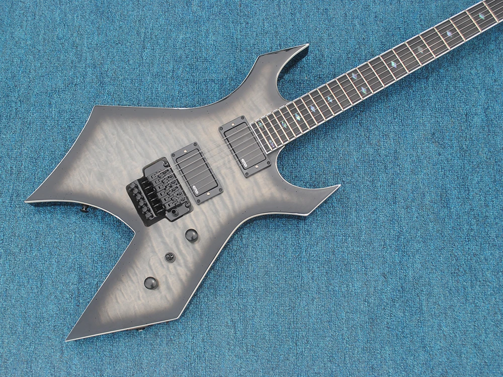 

In stock-B.C. Rich "Warlock "Electric Guitar, Floyd Rose Vibrato Bridge, lock string nut, active pickup, Flame maple top