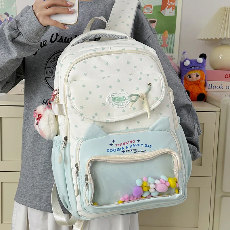 Sac à dos TRAVEASY 2026 Nouveau motif étoile cœur pour femme, en nylon, avec poche transparente et pendentif, grande capacité, pour étudiante