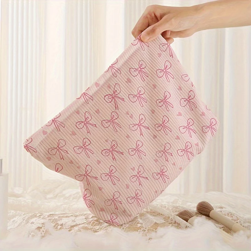 Minimally designed pink bow pattern printed corduroy zipper makeup bag, lightweight and multifunctional cosmetic storage bag